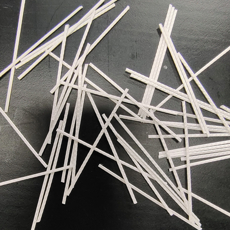 Fibre macro en polypropylène de diamètre 0,7 mm et de résistance à la compression 500 MPa.jpg Fibre macro en polypropylène de diamètre 0,7 mm et de résistance à la compression 500 MPa.jpg