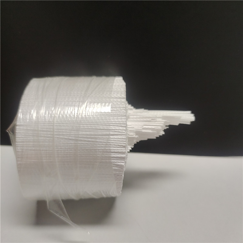Film PVA hydrosoluble emballant des macrofibres de polypropylène.jpg